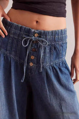 Ruched Mid Rise Tie Front Jeans