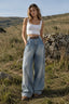 Curved Cut Wide Leg Distressed Jeans