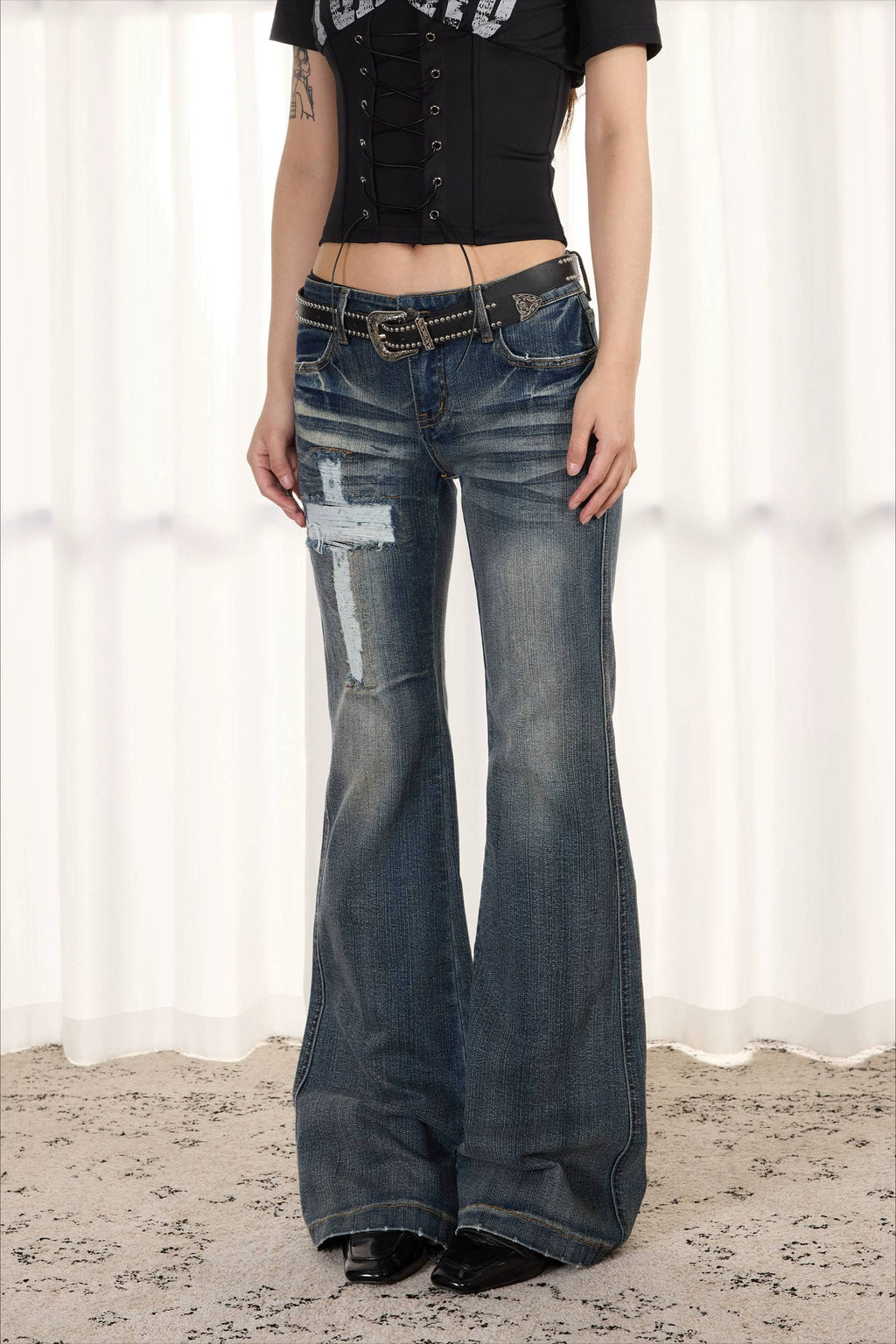 Distressed Cross Low Rise Slim Flare Jeans