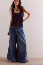 Ruched Mid Rise Tie Front Jeans