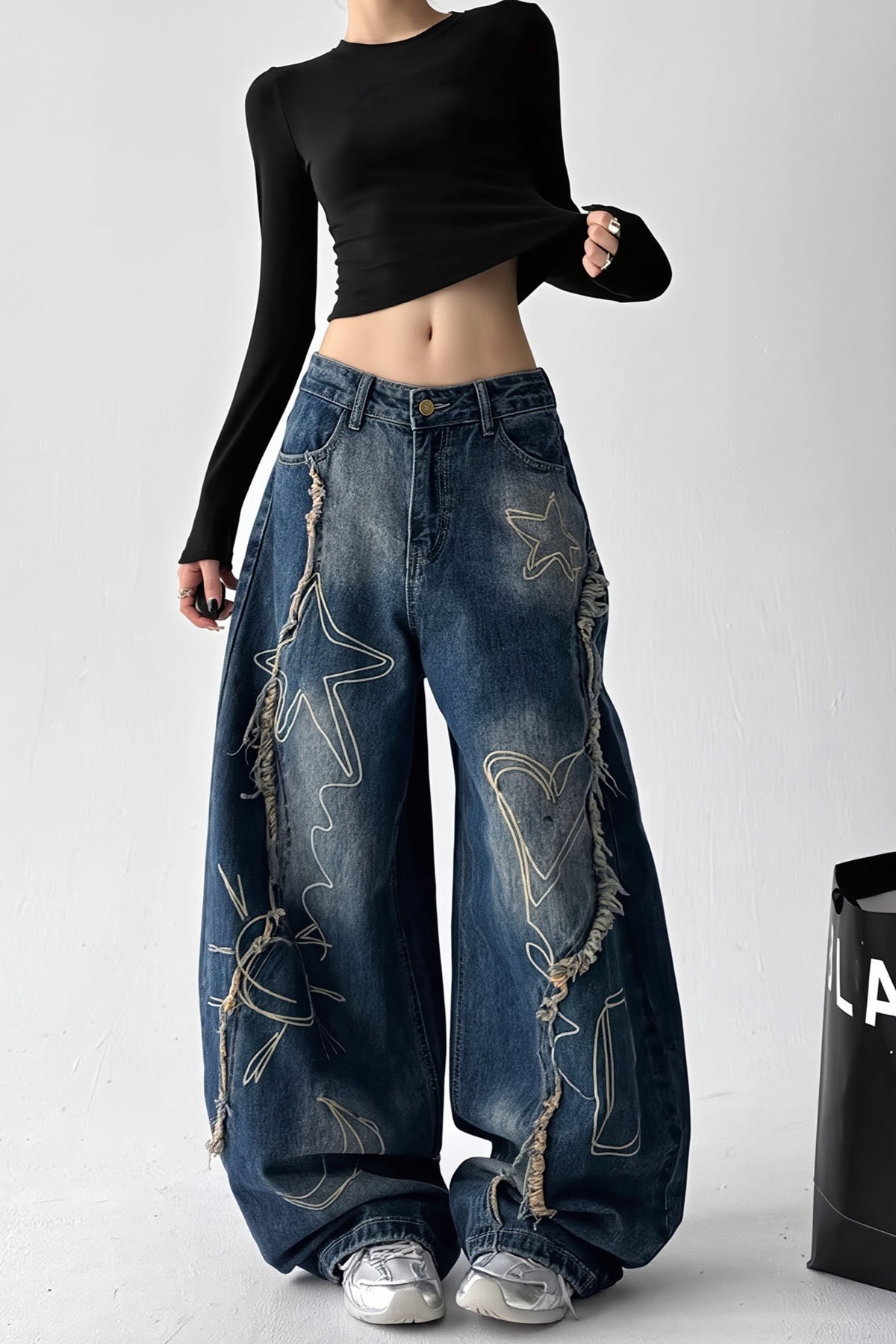 Distressed High Rise Barrel Leg Jeans