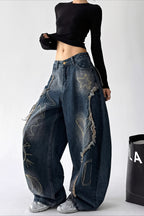 Distressed High Rise Barrel Leg Jeans