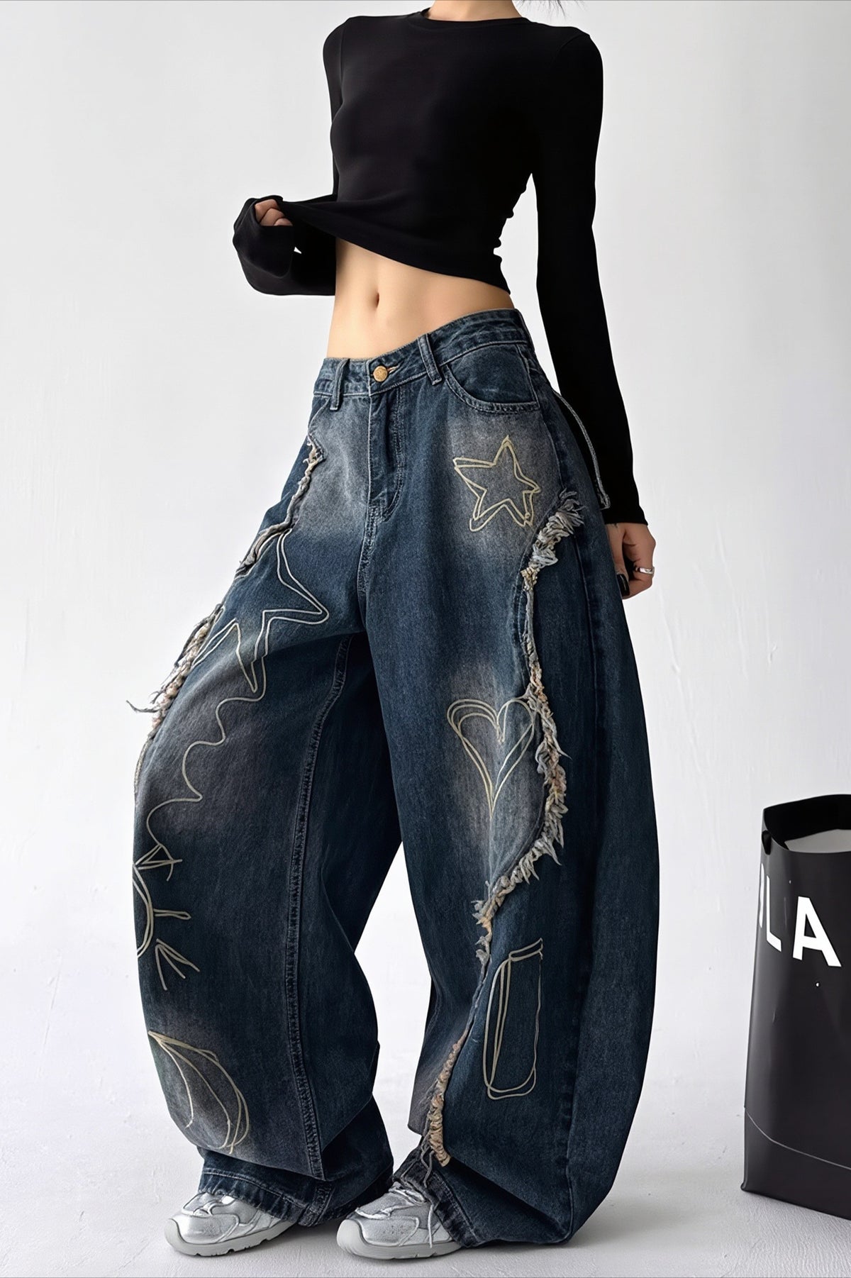 Distressed High Rise Barrel Leg Jeans